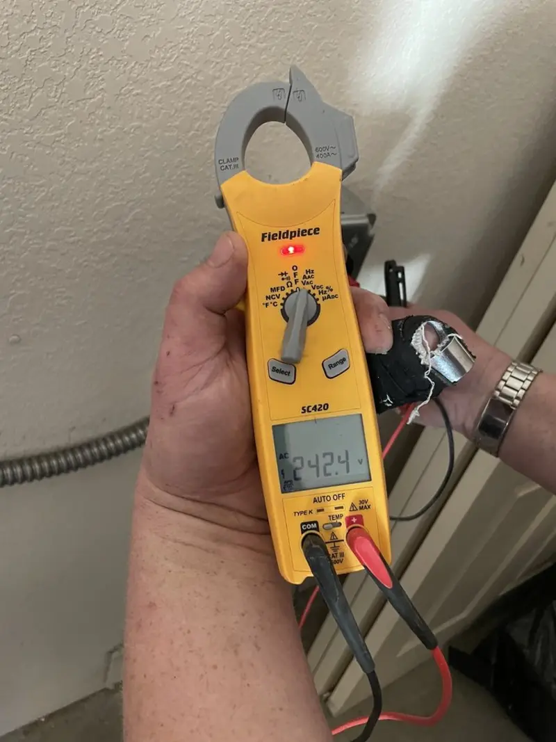 Voltage testing with clamp meter during Whole House Surge Protector in Schroeppel